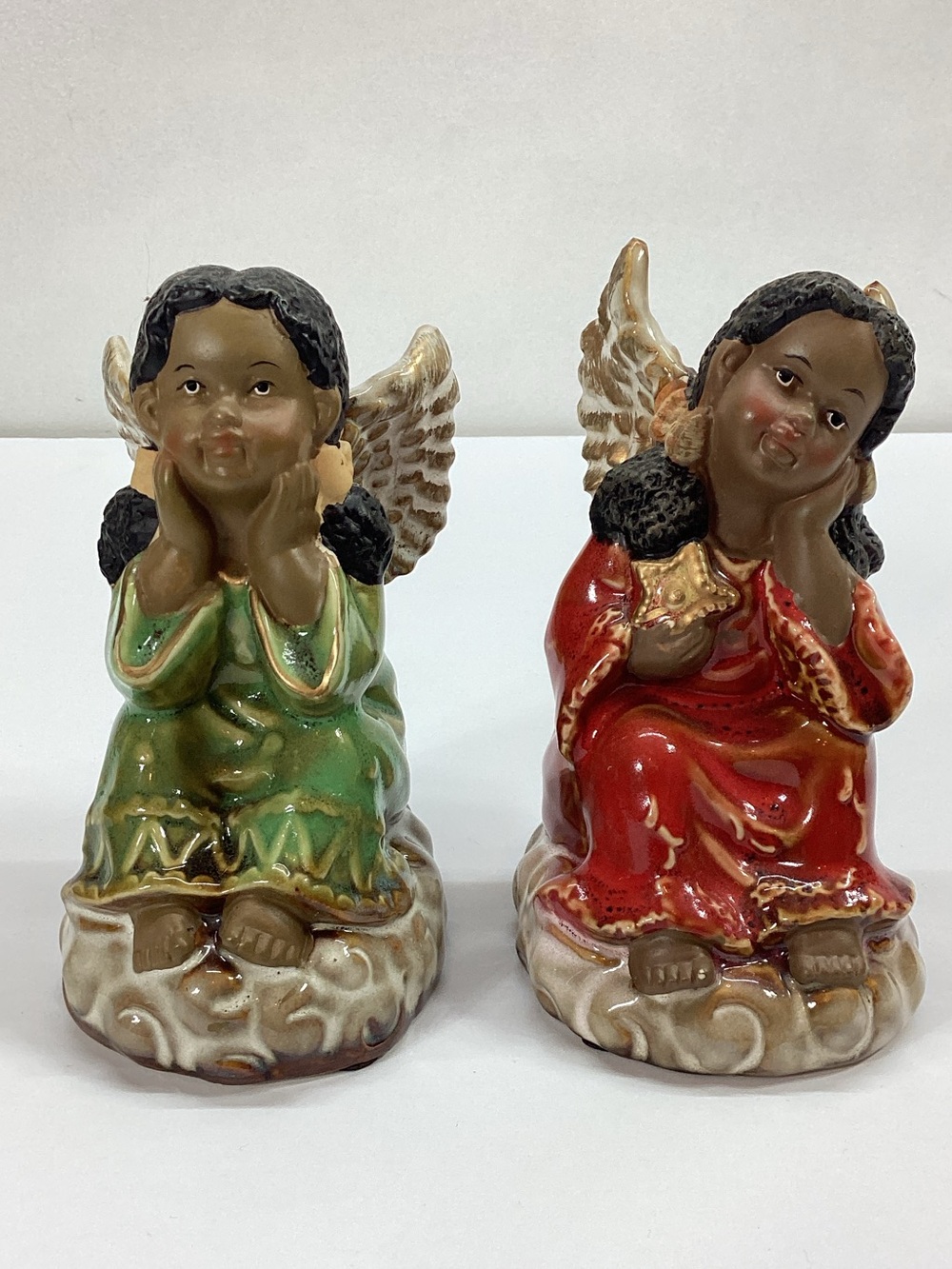 Set of 2 Ceramic Brown Angel Figurines Dressed in Green and Red